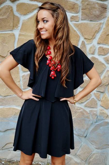 black dress with red necklace
